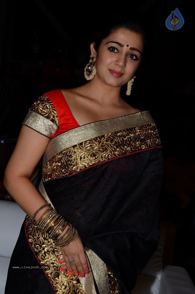 Charmi at Jyothi Lakshmi Audio Launch - 15 / 39 photos