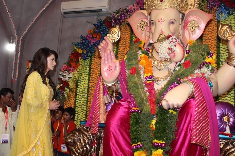 Urvashi Rautela and Poonam Pandey Ganesh Darshan Photos - 9 / 28 photos