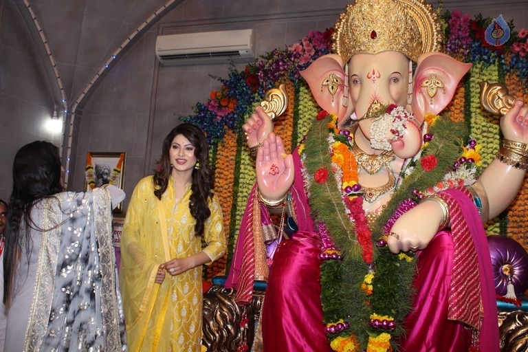 Urvashi Rautela and Poonam Pandey Ganesh Darshan Photos - 19 / 28 photos