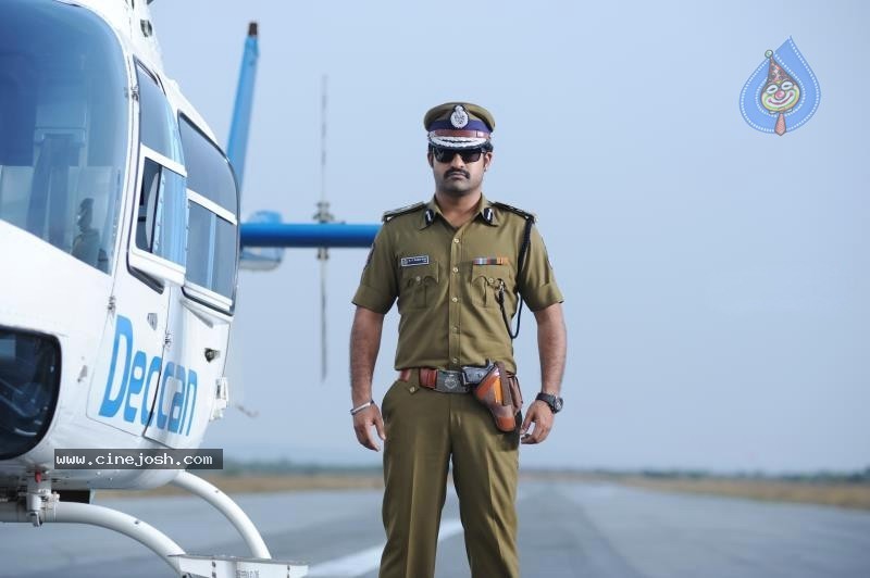 NTR in Police get up of Baadshah - 6 / 9 photos