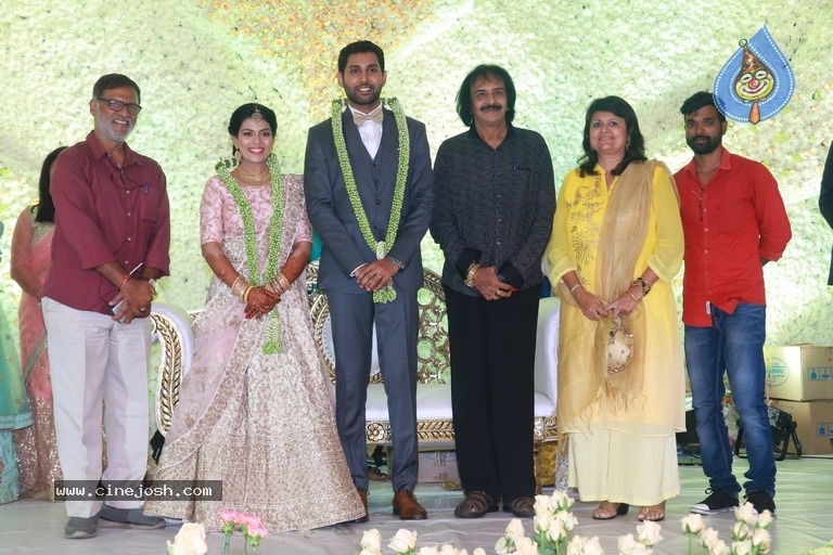 Aadhav Kannadasan - Vinodhnie Wedding Reception Photos - 18 / 21 photos