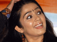 Charmi-threatening-Mamatha-Mohandas