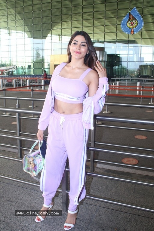 Nikki Tamboli Spotted At Airport - 12 / 17 photos