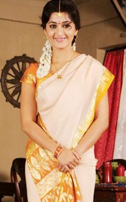 Anushka looks hot in either way.