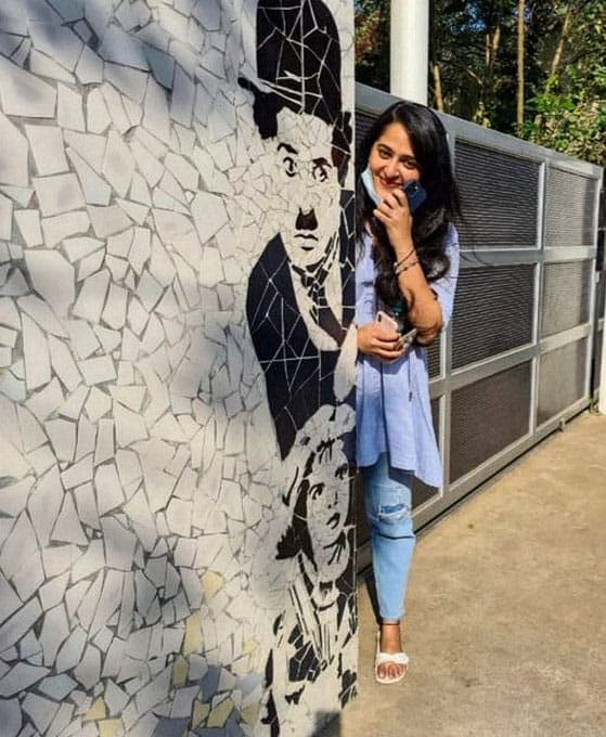 Anushka next to Charlie Chaplin