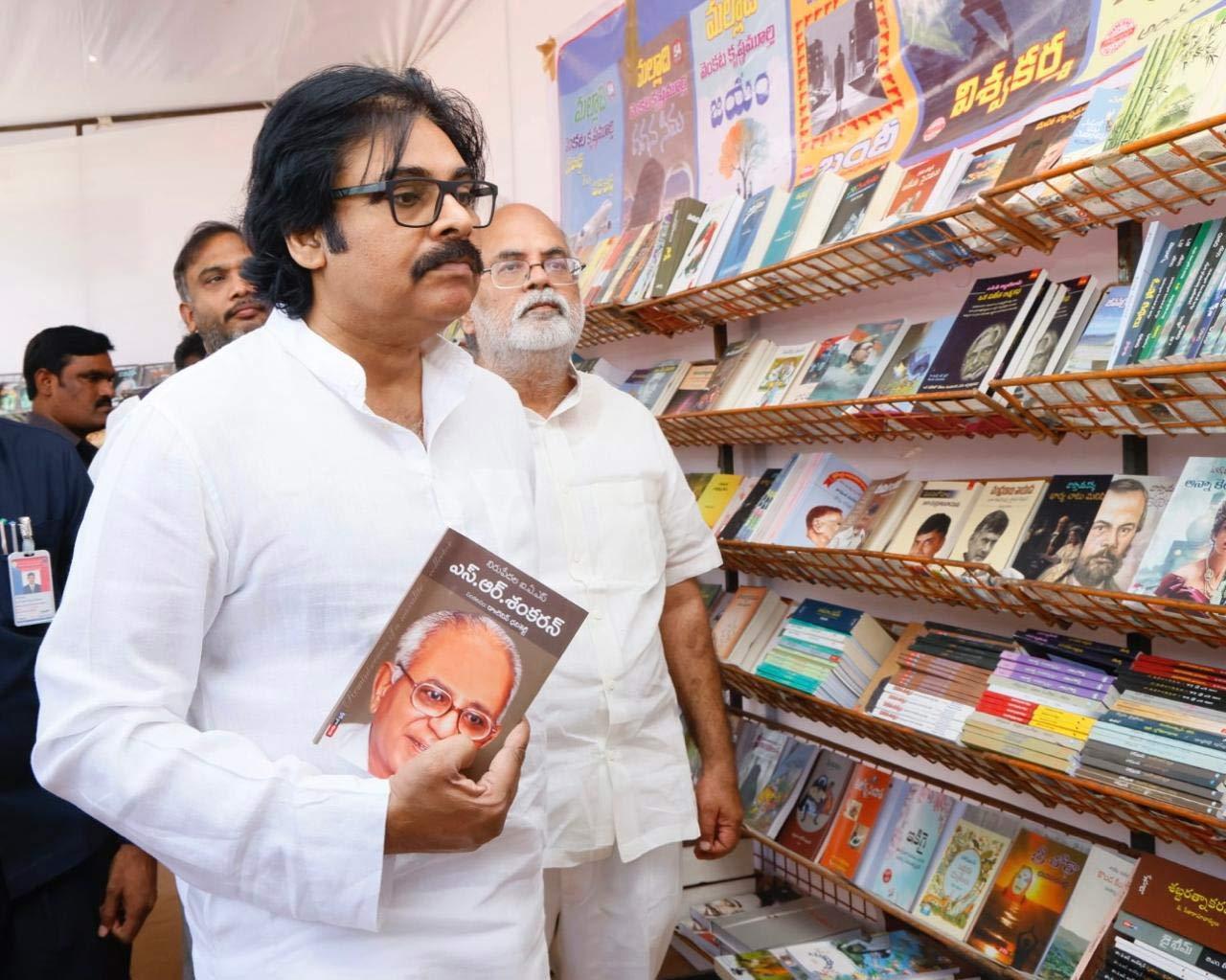 Pawan Kalyan purchases 6th 9th class books at a book fair