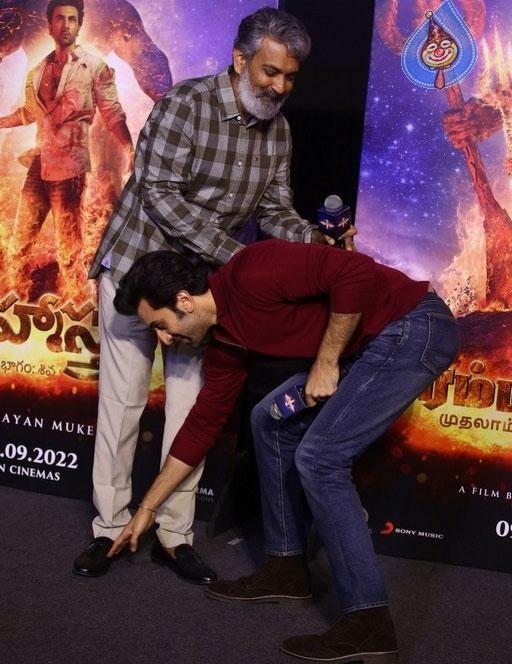 Bollywood Hero touches director Rajamouli feet