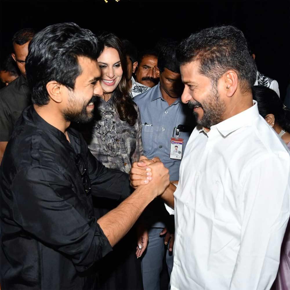 CM Revanth Reddy Hug To Ram Charan