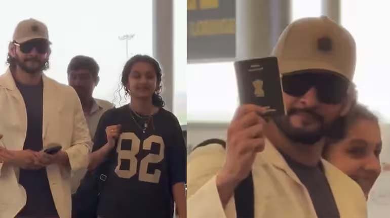 Mahesh at the airport showing his passport