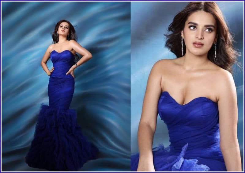  Nidhi Agarwal is cracking in blue dress