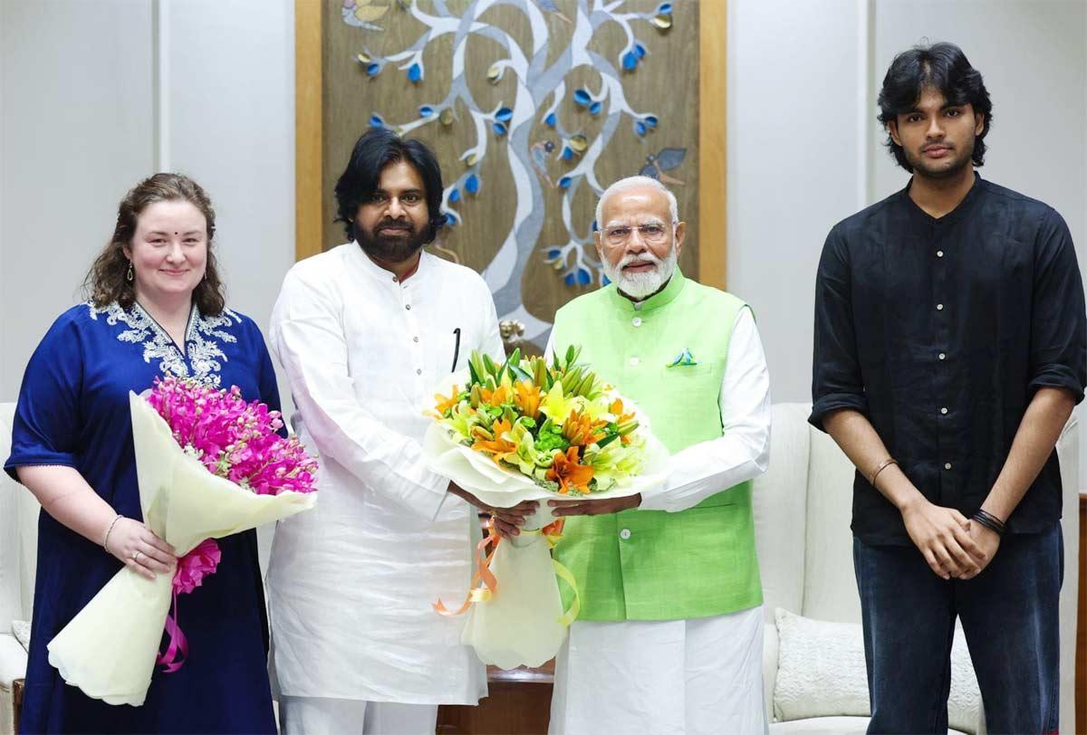 Pawan Kalyan and Akira Nandan with Narendra Modi