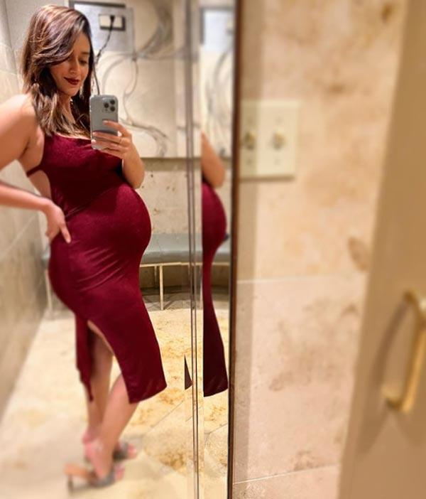 Pregnant Ileana Cradles Her Baby Bump