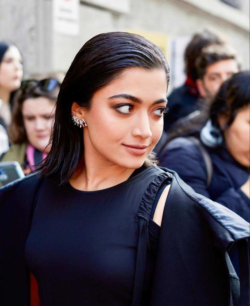 Rashmika Onitsuka Tiger brand stands in Milan Fashion Week 