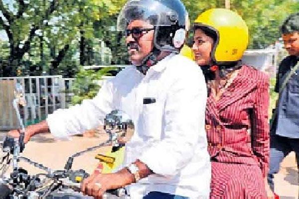 TS Minister Takes Actress For Ride
