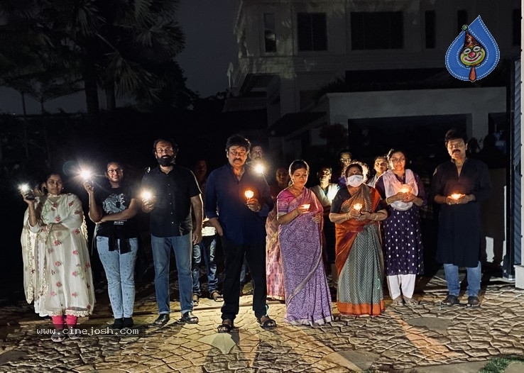 Chiru Family With Candles - 5 / 6 photos