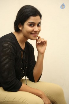 Satna Titus Photos
