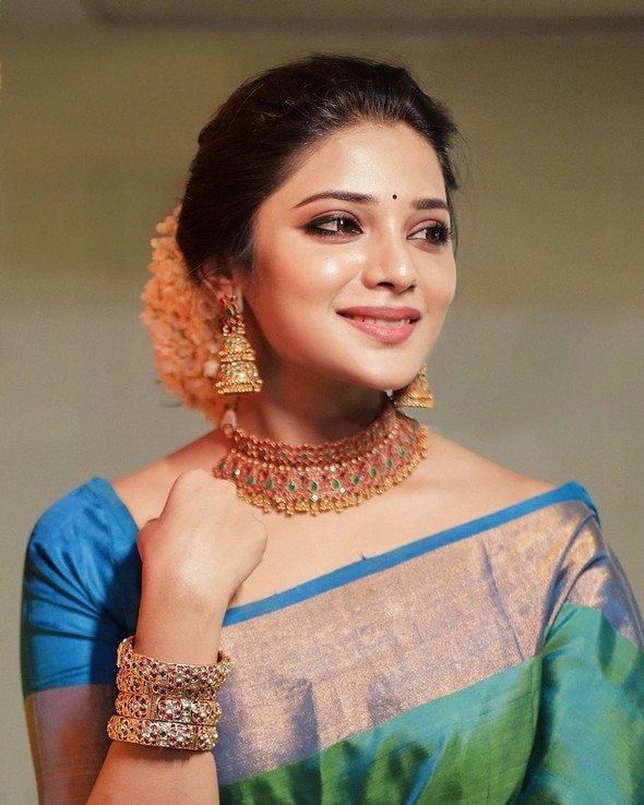 Aathmika Stills - 10 / 10 photos