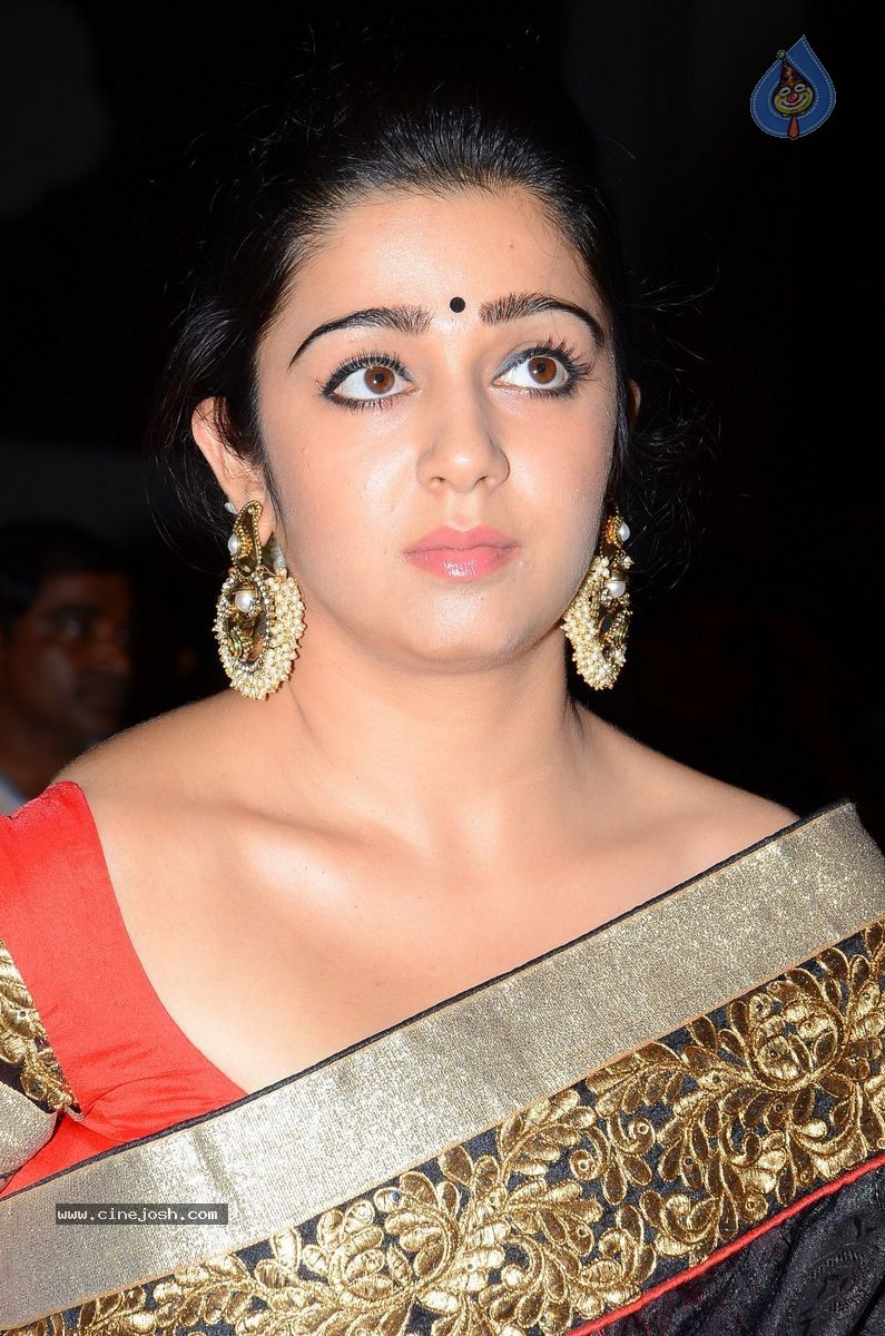 Charmi at Jyothi Lakshmi Audio Launch - 18 / 39 photos