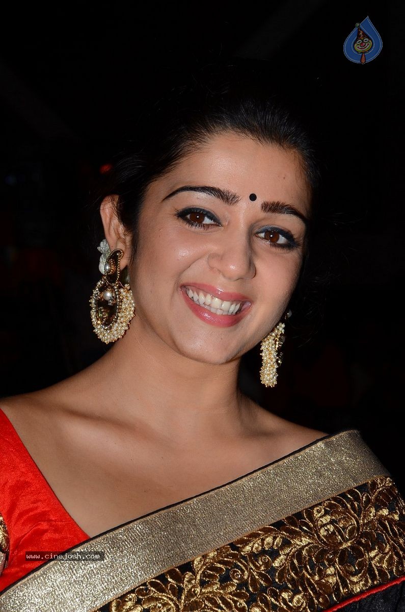 Charmi at Jyothi Lakshmi Audio Launch - 22 / 39 photos