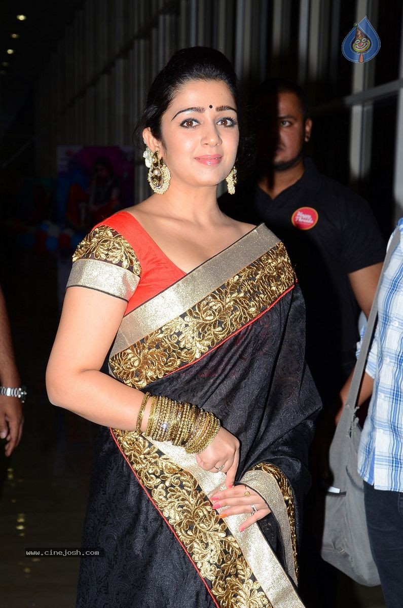 Charmi at Jyothi Lakshmi Audio Launch - 24 / 39 photos