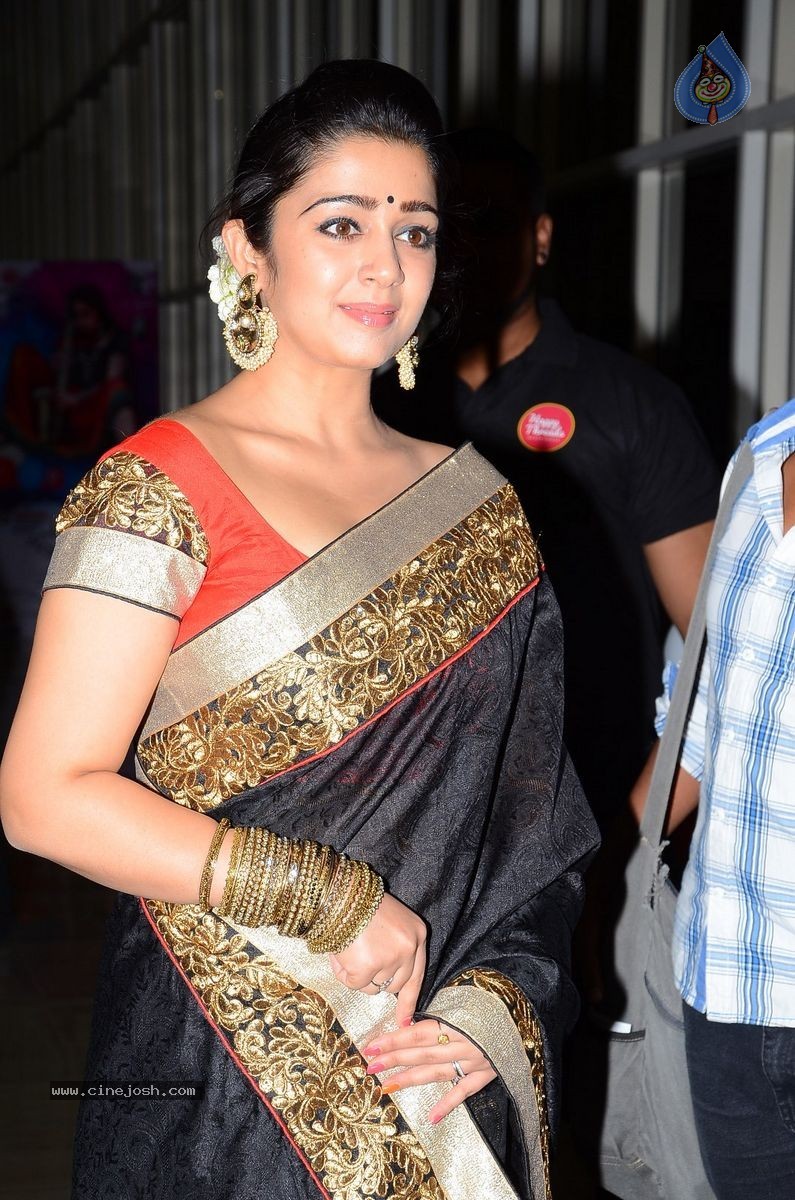 Charmi at Jyothi Lakshmi Audio Launch - 30 / 39 photos
