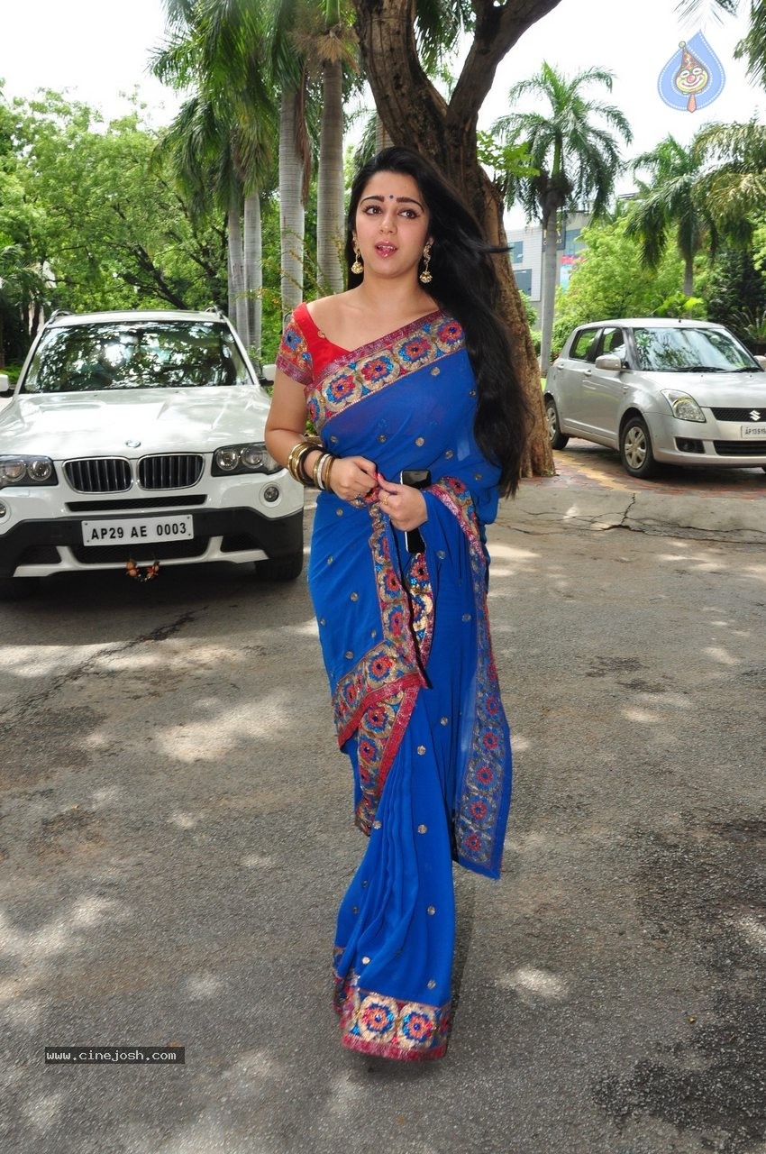 Charmi at Jyothi Lakshmi SM - 25 / 83 photos
