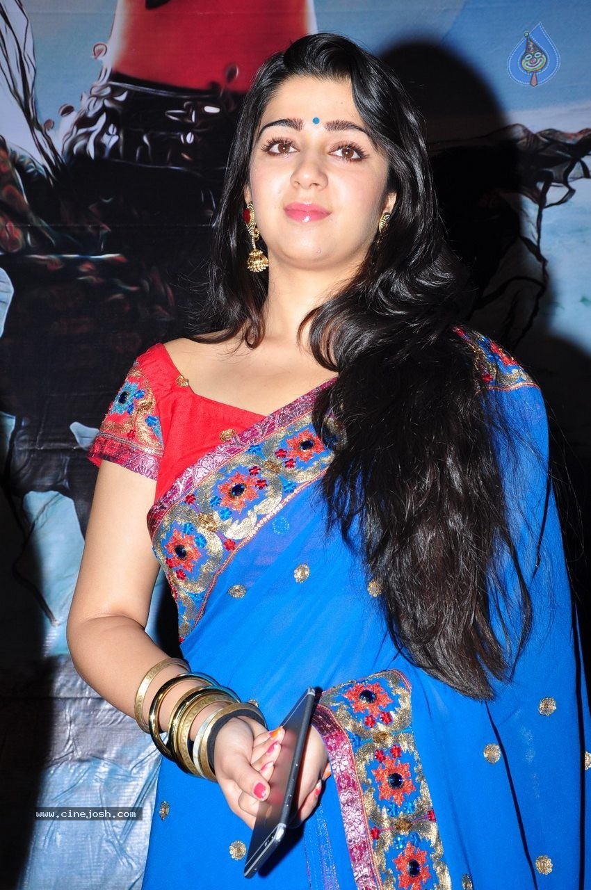 Charmi at Jyothi Lakshmi SM - 26 / 83 photos