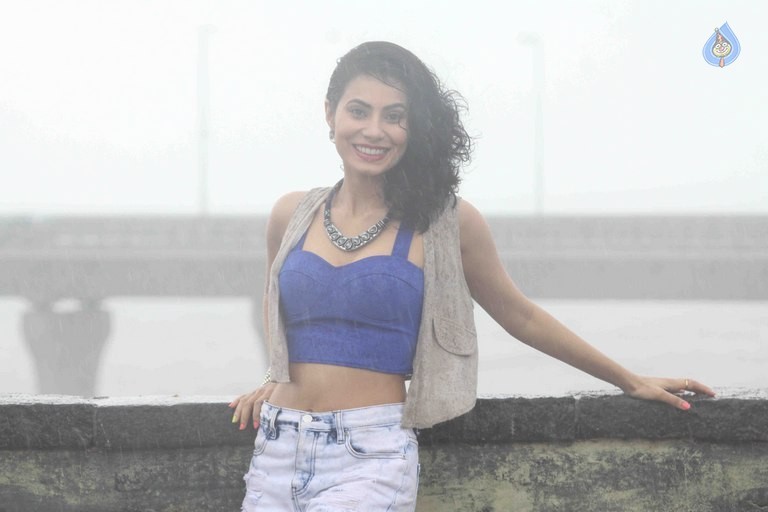 Manisha Kelkar Glamorous Rain Photo Shoot - 16 / 26 photos