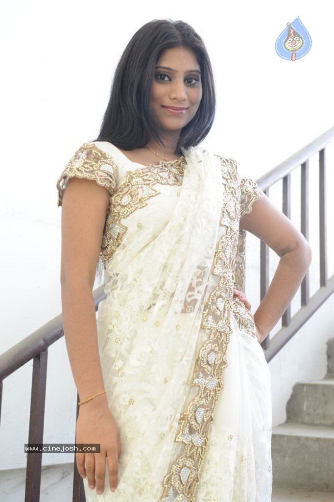 Midhuna New Stills - 27 / 30 photos