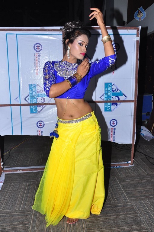 Nisha New Pics - 11 / 21 photos