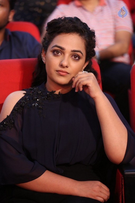 Nithya Menon at Janatha Garage Audio Launch - 22 / 42 photos