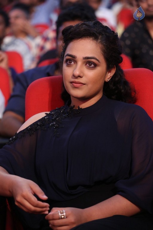 Nithya Menon at Janatha Garage Audio Launch - 23 / 42 photos