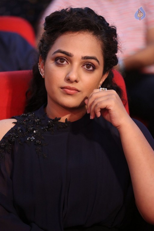 Nithya Menon at Janatha Garage Audio Launch - 27 / 42 photos
