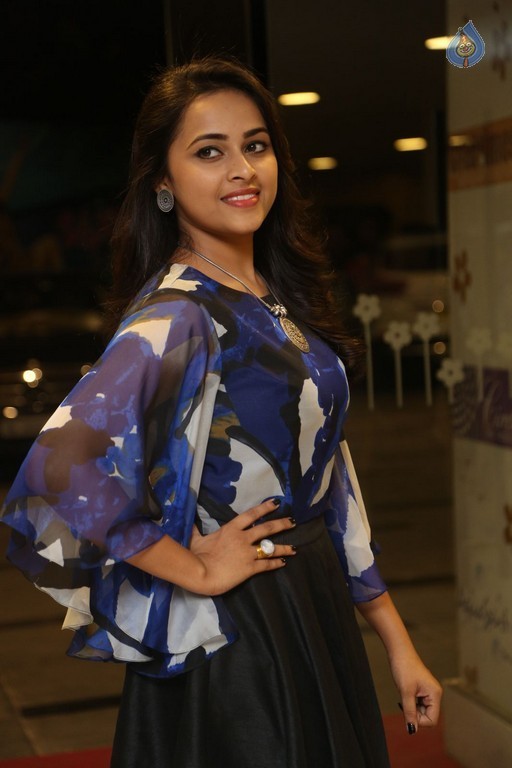 Sri Divya New Pics - 38 / 42 photos