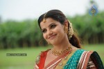 Madhu Sharma In Pravarakyudu Movie Stills - 18 of 26