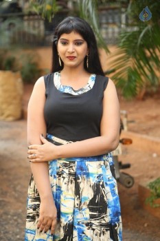 Poorni New Photos - 3 of 27