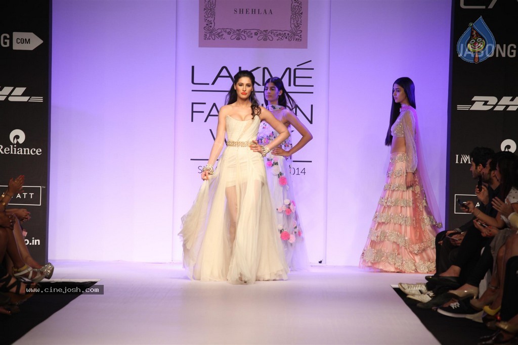 Celebs at LFW Summer Resort 2014 - 3 / 107 photos