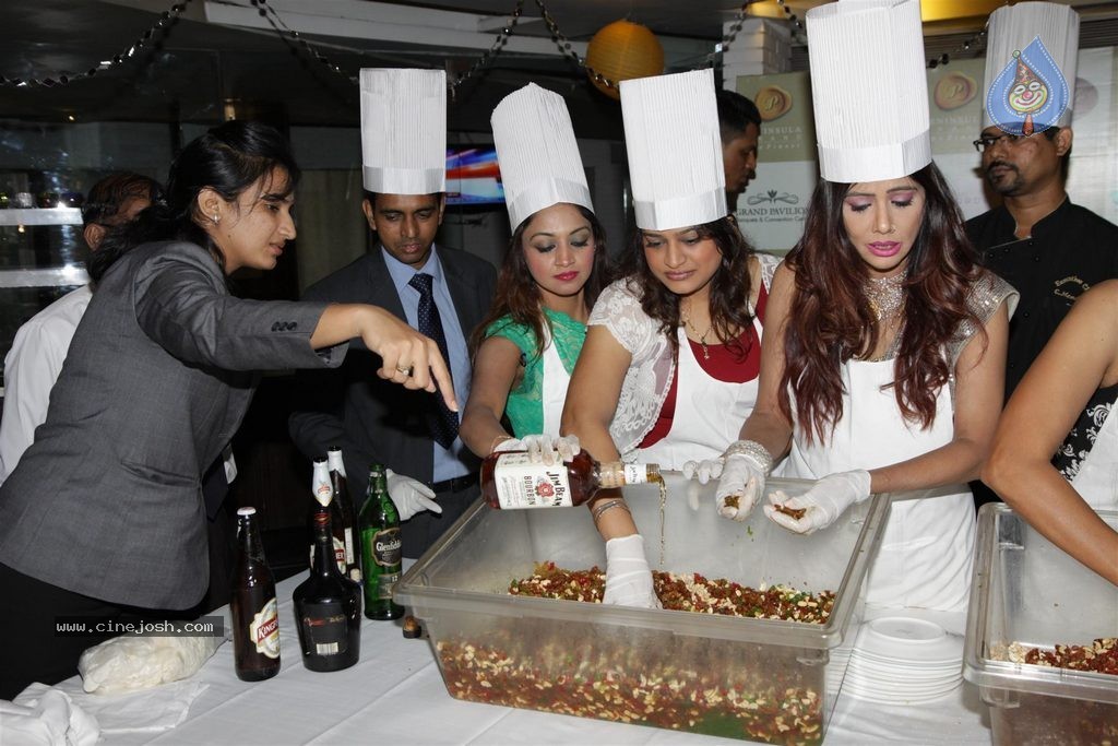 Celebs at Peninsula Grand Hotel Cake Mixing - 41 / 58 photos
