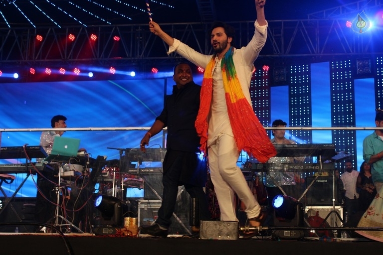 Judwaa 2 Film Team Visit Navratri Garda Night - 4 / 17 photos
