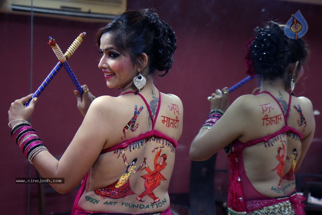 Tanisha Singh Hot Back Painting Photo Shoot - 3 / 31 photos