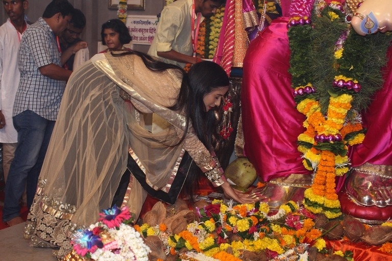 Urvashi Rautela and Poonam Pandey Ganesh Darshan Photos - 7 / 28 photos