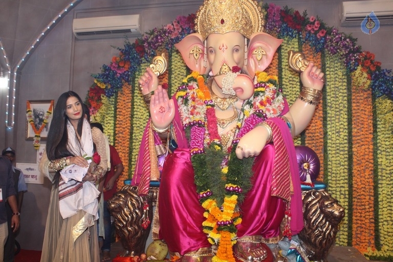 Urvashi Rautela and Poonam Pandey Ganesh Darshan Photos - 11 / 28 photos