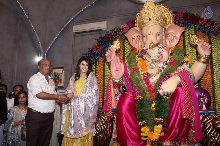 Urvashi Rautela and Poonam Pandey Ganesh Darshan Photos - 24 / 28 photos