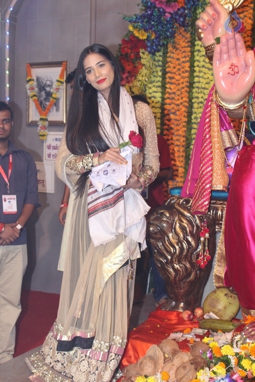 Urvashi Rautela and Poonam Pandey Ganesh Darshan Photos - 25 / 28 photos