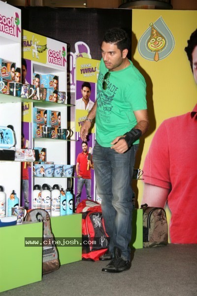 Yuvraj Singh showcasing products at the launch - 10 / 15 photos
