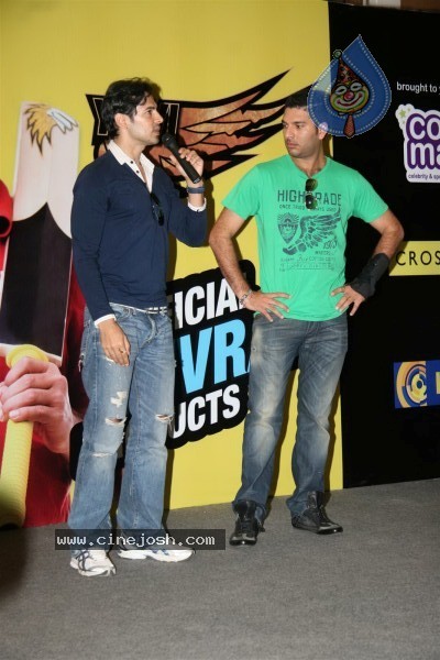 Yuvraj Singh showcasing products at the launch - 13 / 15 photos