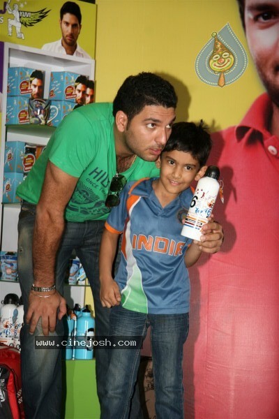 Yuvraj Singh showcasing products at the launch - 15 / 15 photos