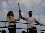 John Abraham,Maria Polyzou At Marathon Flame Run - 2 of 25