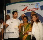 John Abraham,Maria Polyzou At Marathon Flame Run - 5 of 25