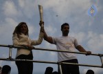 John Abraham,Maria Polyzou At Marathon Flame Run - 13 of 25